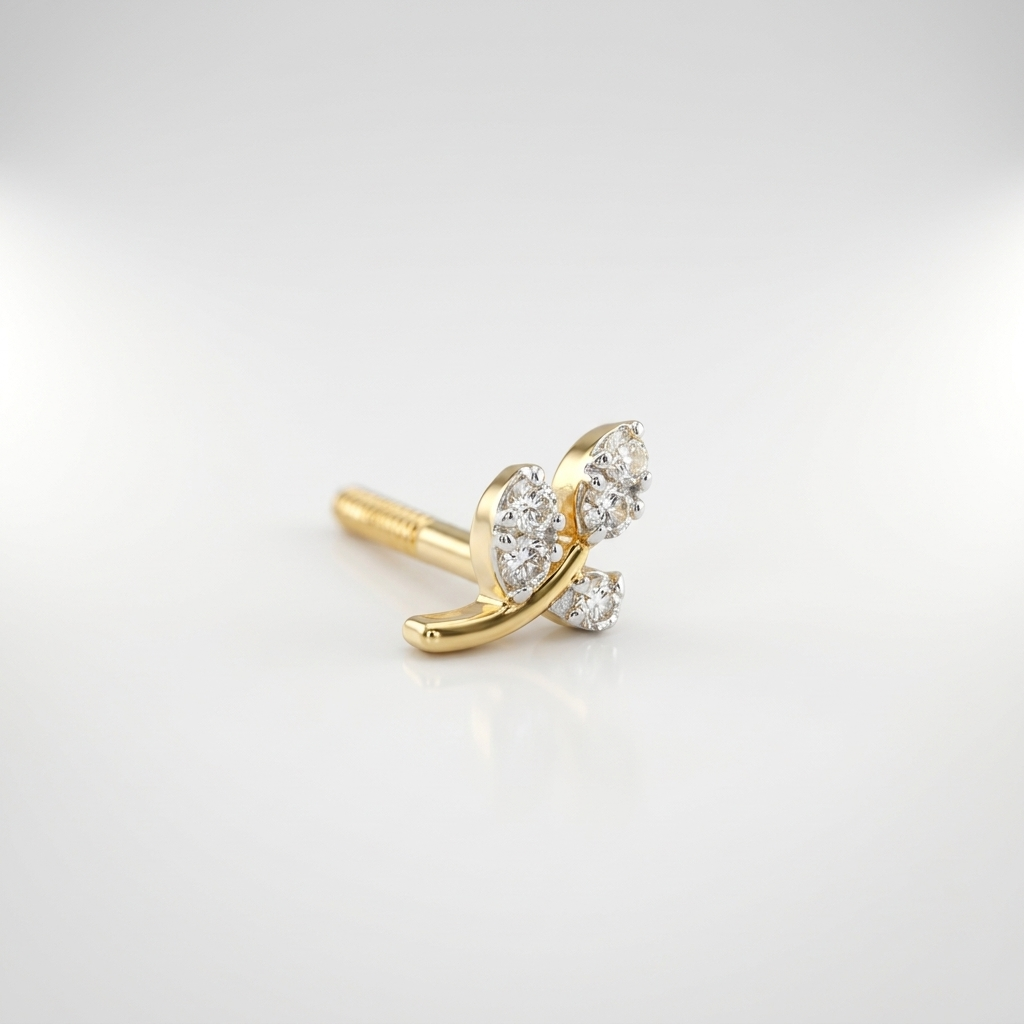 Profile view of a single 14k solid yellow gold leaf branch stud earring with natural diamond leaves on a curved gold stem, shown on a soft white background.
