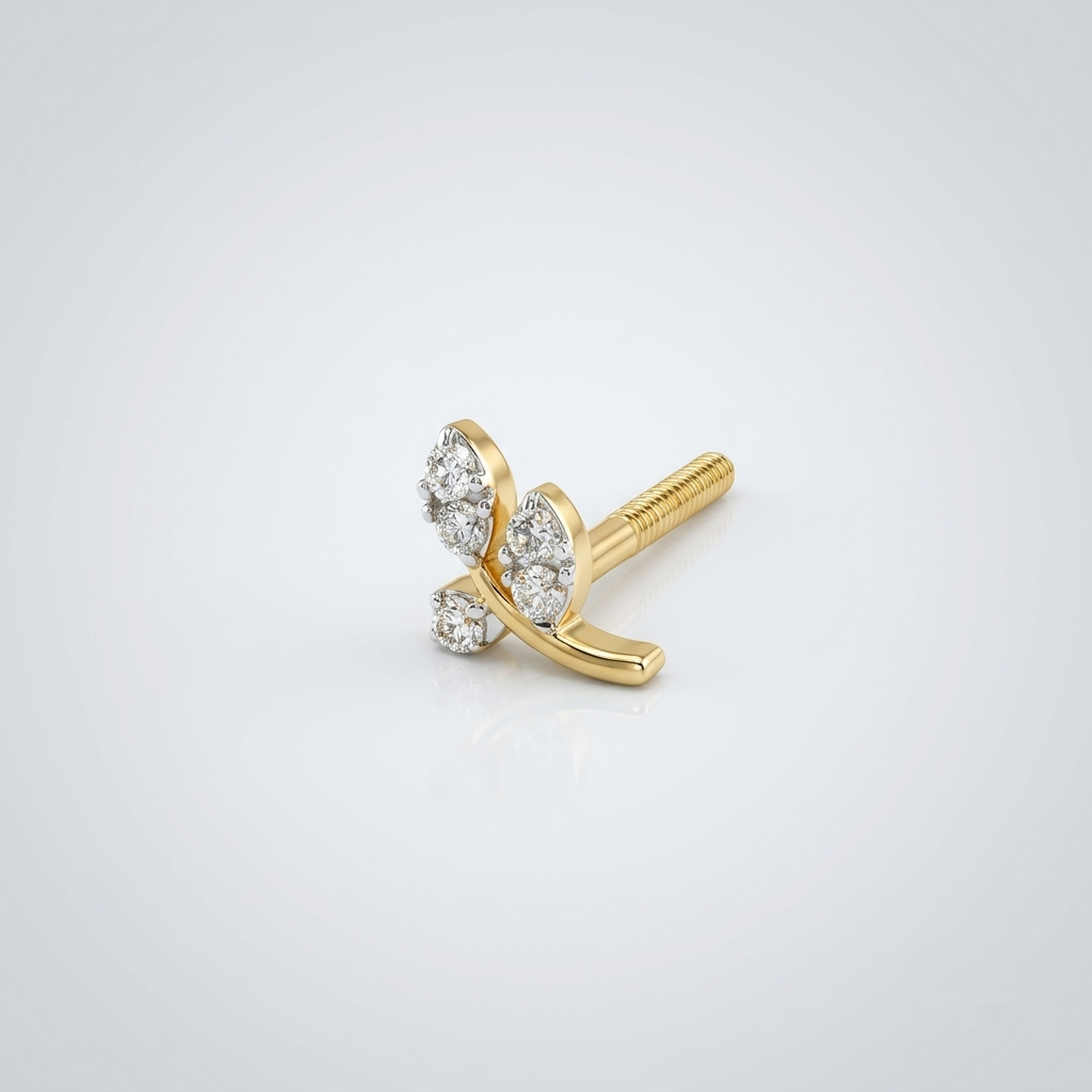 Side view of a single 14k solid yellow gold leaf branch stud earring with natural diamond leaves on a curved gold stem, showing its threaded screw-back post on a soft white background.