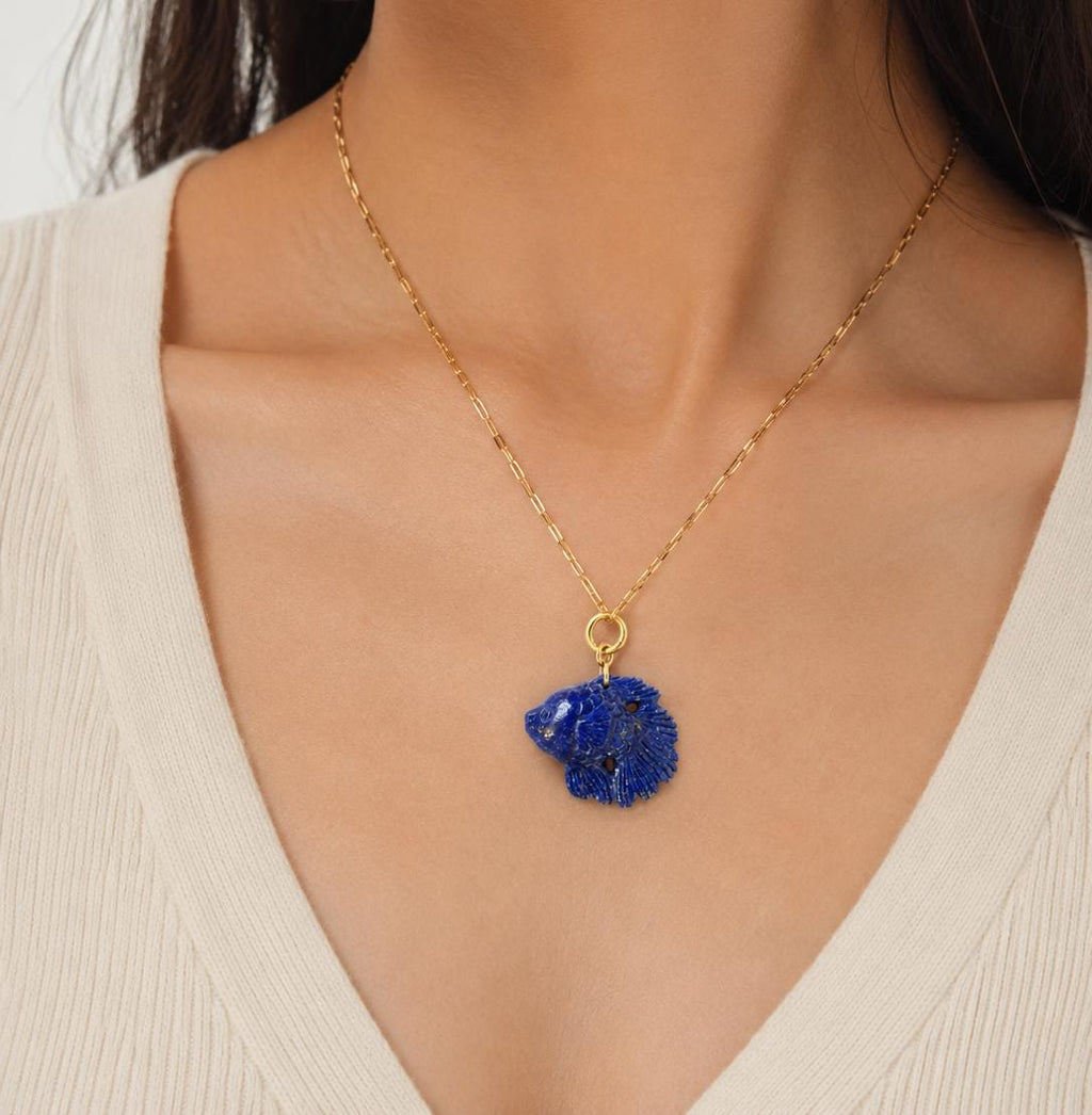 Model Wearing Lapis Lazuli Fish Pendant – Carved Blue Gemstone Betta Fish Gold Chain Necklace
