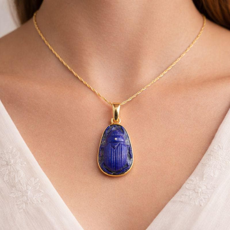 Model Wearing Lapis Lazuli Scarab Pendant – Carved Deep Blue Gemstone Egyptian Scarab Gold Necklace
