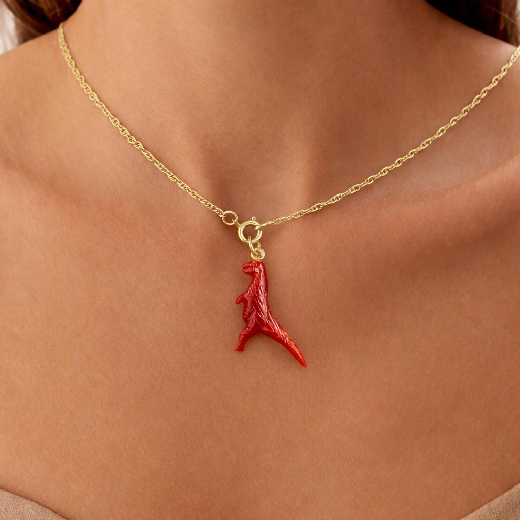 Model Wearing Red Coral T-Rex Pendant – Hand Carved Vivid Red Dinosaur Gemstone Gold Chain Necklace
