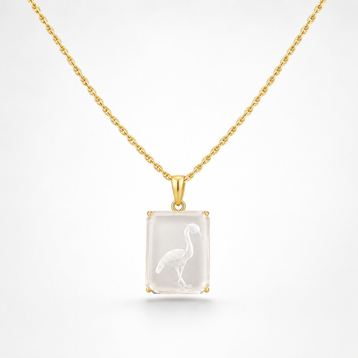 Rock Crystal Heron Intaglio Pendant on Gold Rope Chain – Emerald-Cut Clear Quartz 4-Prong Gold Bezel
