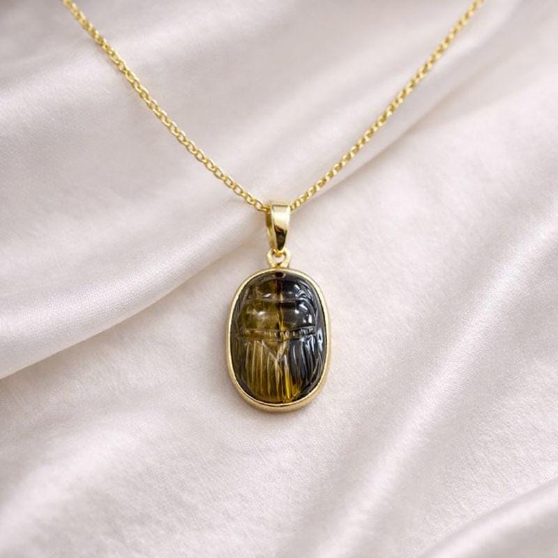 Tiger Eye Oval Scarab Pendant on White Satin – Carved Chatoyant Gemstone Egyptian Gold Necklace
