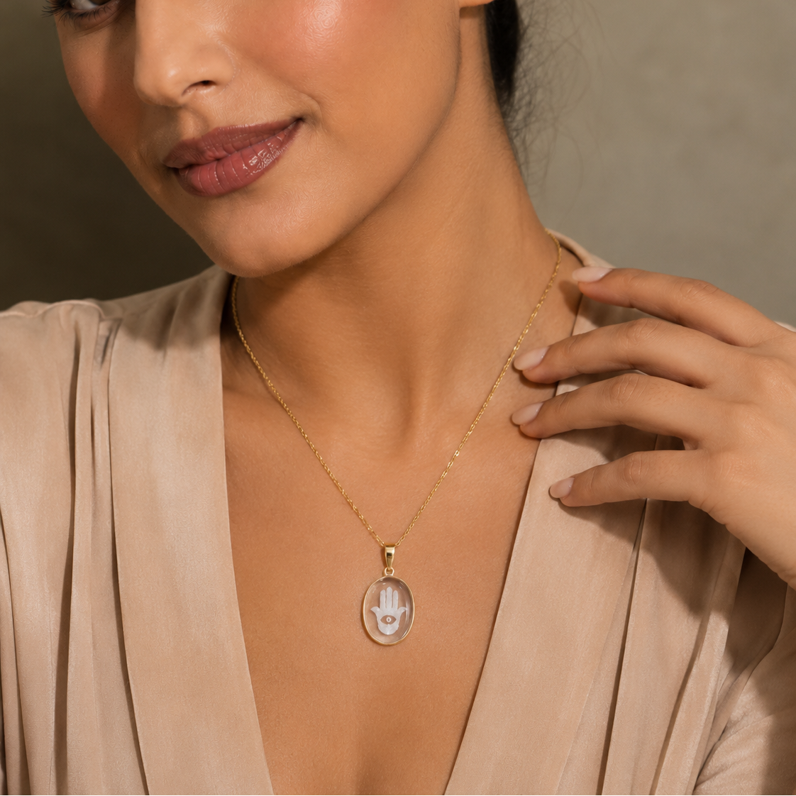 Model Wearing Rock Crystal Hamsa Hand Pendant – Carved Clear Quartz Evil Eye Gold Bezel Necklace
